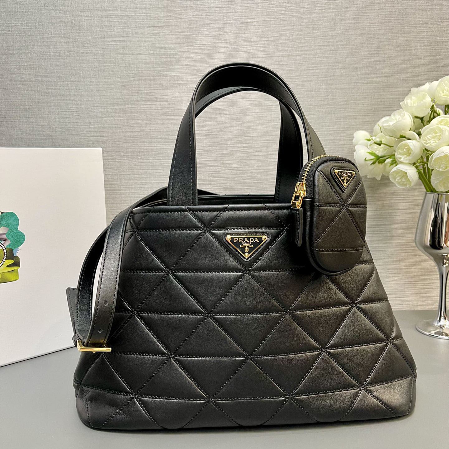 Pra*a top handle bags